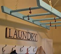 Image result for Clothes Hanger Rack with Drawers