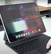 Image result for iPad Pro with Magic Keyboard and Mouse