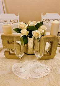 Image result for Champagne and Rose Gold Centerpieces