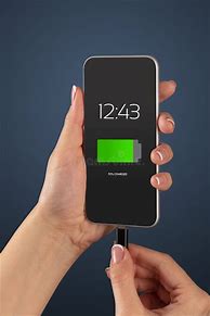 Image result for Charging Phone Stock Image