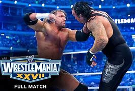 Image result for Undertaker vs Triple H Wrestlemania 28