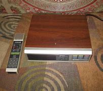 Image result for 80s Hitachi TV with Remote That Slots in the TV