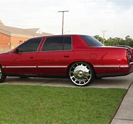 Image result for Cadillac DeVille Chrome Rims