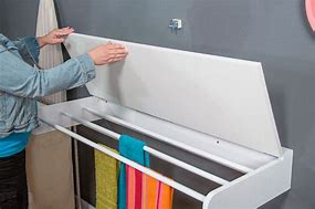 Image result for Wall Mounted Fold Away Clothes Rack
