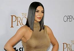 Image result for Kim Kardashian Adjusting Hair