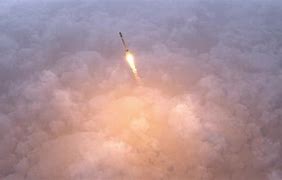 Image result for Space Shuttle through Clouds