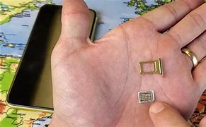 Image result for iPhone 11 Inserting Sim Card
