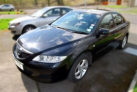 Image result for All-Black Mazda 6 2003