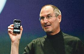 Image result for Steve Jobs Holding an iPhone
