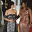 Image result for Michelle Obama Gold Gown