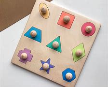 Image result for Montessori Wooden Toddler Puzzles