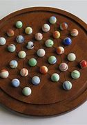 Image result for Old Board Games with Marbles