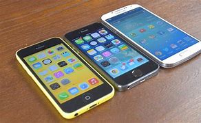 Image result for Galaxy S4 and iPhone 5C