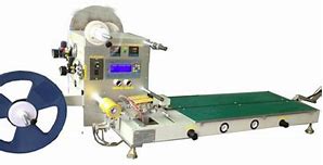 Image result for Tape and Reel Packaging Machine