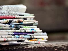 Image result for Read Newspaper with Zoom Lens