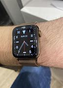 Image result for Black Apple Watch with Gold Milanese Band