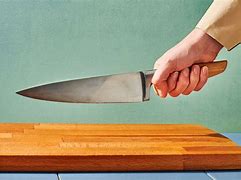 Image result for How to Hold a Chef Knife