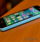 Image result for iPhone 5C in Hnd