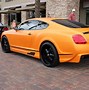Image result for Bentley SUV Orange