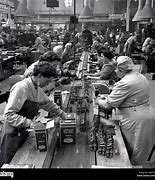 Image result for Humans Working in Factories