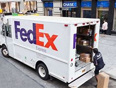 Image result for People with FedEx Boxes