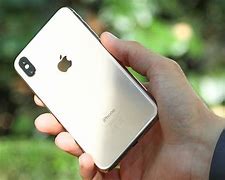 Image result for Gold iPhone XS Max with Black Case