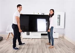Image result for 65 Inch TV Next to Person