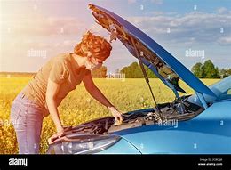 Image result for Woman On Broken Car