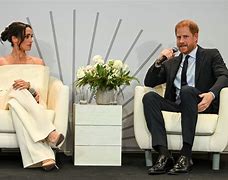 Image result for Images of Oprah Winfrey Boots with Meghan Markle and Prince Harry
