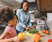 Image result for Adult and Child Cooking at Preschool