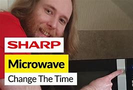 Image result for Sharp Carousel Microwave Clock Set