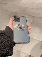 Image result for Blue iPhone 12 with Gold and Clear Case