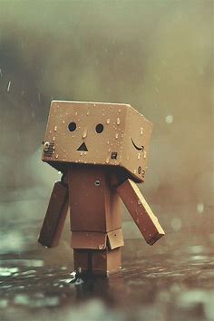 Sitting in the rain | Danbo, Cute cartoon boy, Box art