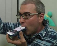 Image result for Phone in Mouth Meme