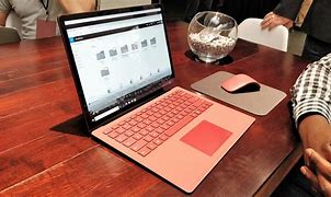 Image result for Microsoft Red Laptop