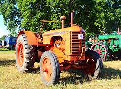 Image result for Orange Case Tractors