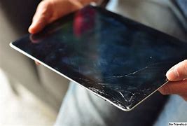 Image result for Picture of Damaged iPad From Sitting On It