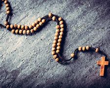 Image result for Devout Rosary Praying