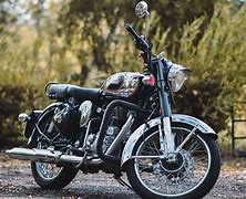 Image result for Royal Enfield Classic 500 Chrome Black with Saddlebags