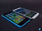 Image result for Galaxy S4 vs iPhone 5C