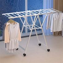 Image result for Fold Away Drying Rack Laundry