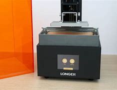 Image result for Person Examing Printer