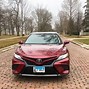 Image result for Toyota Camry XSE 2018 Black with Red Interior