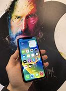 Image result for Red iPhone XR with Air Pods