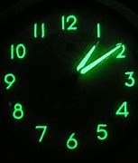 Image result for Sharp Glow in the Dark Atomic Clock