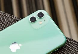 Image result for iPhone 12 Green in Hand