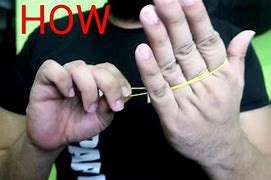 Image result for Rubber Band Magic Tricks