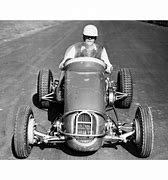 Image result for Man Driving Race Cars
