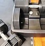 Image result for Dumbell with Adjustable Weight