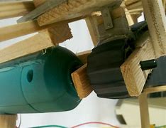 Image result for Ball Throwing Machine